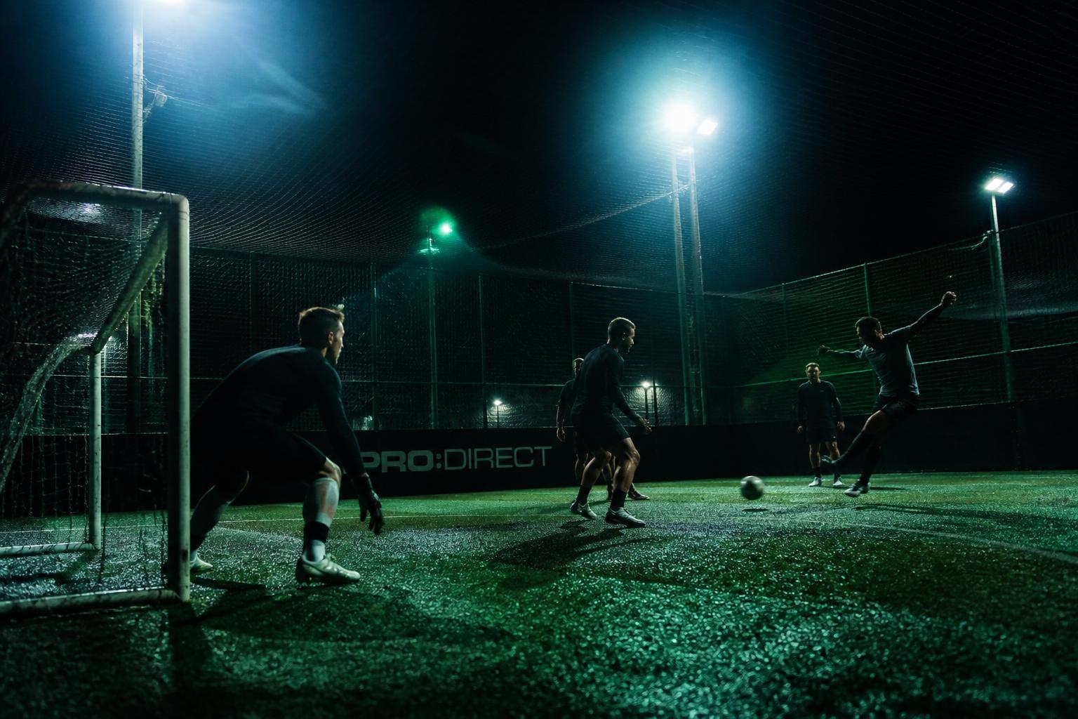 Floodlit football turf in Kanpur at night